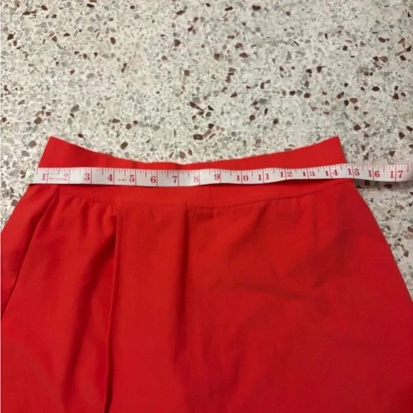 Alo Yoga Women's Alosoft Backspin Skirt in a bright red medium - Picture 5 of 9
